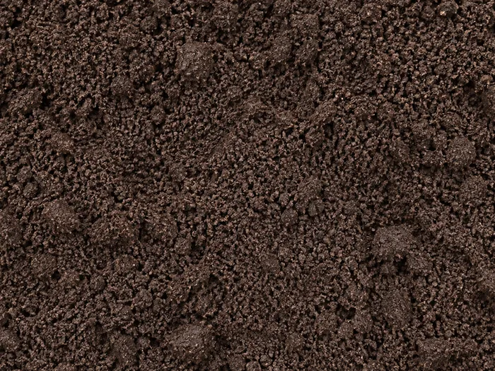 Close view of dark screened topsoil
